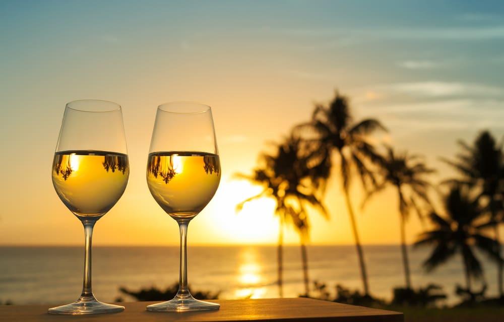 Winery in St. Augustine, photo of wine glasses on the beach