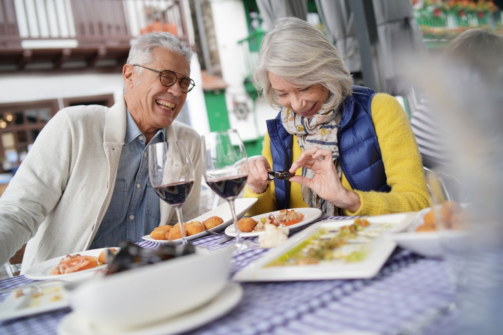 Couple dining outdoors at one of the best St. Augustine Restaurants