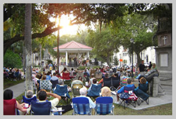 People enjoying the music in the plaza.