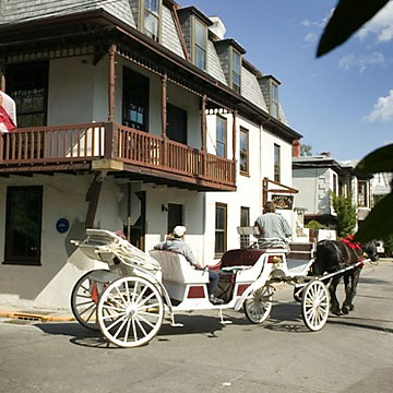 horse carriage tour passing St Francis Inn